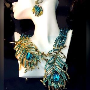 Heidi Daus” Peacock 🦚 PARADISE” Elegant Gold and Blue Peacock Feather Set